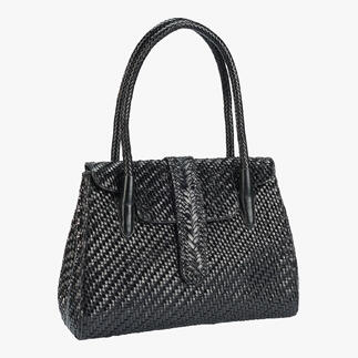 Allan K Flechtleder-Tote Bag in Schwarz, seitlich stehend.