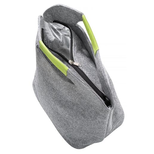 Vous ouvrez facilement le sac à lʼaide de la fermeture à glissière et le remplissez confortablement par le haut.