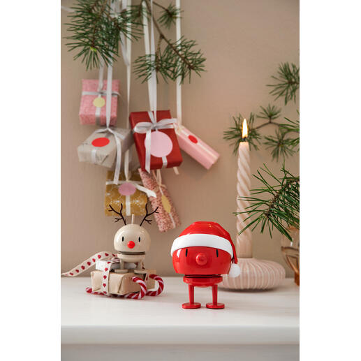 Hoptimist Weihnachten Berühmtes dänisches Design der 60er-Jahre – jetzt putzmunter weihnachtlich aufgelegt. Hoptimist Schneemann in der Weihnachtsdekoration mit Geschenken.