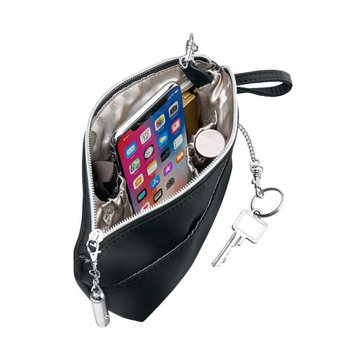 Mit Bag'nBag wechseln Ihre Utensilien auf einen Griff Ihre Handtasche.