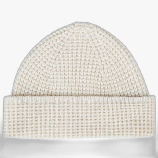 Naturfarbene Lammwollmütze, unisex, mit der Struktur einer groben Strickarbeit.