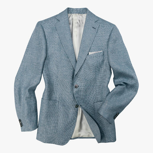 Das Sakko für warme Tage: Tausende luftiger Poren wirken wie eine eingewebte Klimaanlage. Aus italienischem Panama-Tuch konfektioniert von Sakko-Spezialist Carl Gross, seit 1925. Carl Gross Panama-Sakko in Hellblau mit grauem Innenfutter, lässig drapiert.