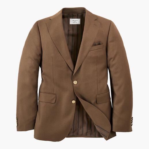 Der Blazer, der mehr kann. Von Carl Gross, edle Herrenkonfektion seit 1925. Luftig gewebt und doch weich gewärmt: Hopsack-Struktur trifft Woll-Kaschmir-Komfort. Offener brauner Blazer auf weißem Hintergrund, mit der Innenseite sichtbar.
