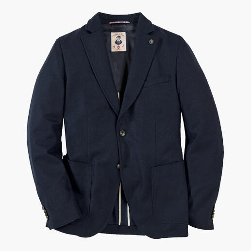 Das Jersey-Sakko aus recyceltem Kaschmir: Ein raffinierter Luxus-Stoff, den man nur selten findet. Hochwertig nach Schneiderart konfektioniert  von CG – Club of Gents. Navy-farbenes Sakko auf einem weißen Hintergrund