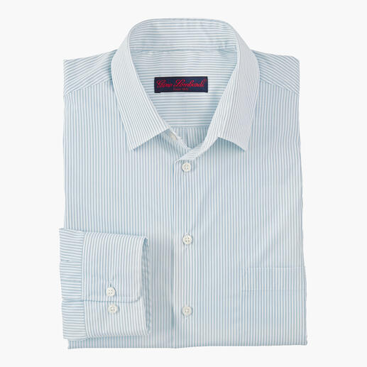 Merino-Seiden-Hemd in Blau-Ecru, gefaltet und auf einem Tisch liegend.