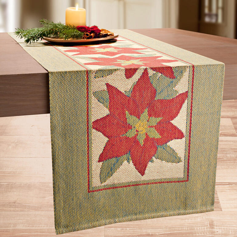 Tischläufer „Christstern“ mit floralen Motiven, ideal für festliche Anlässe.