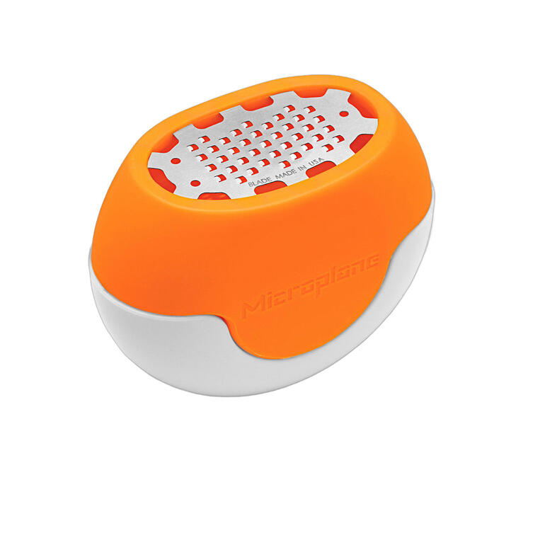 Flexible Zestenreibe in Orange und Weiß