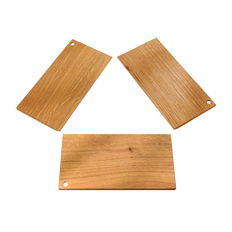 Drei Holzplatten mit verschiedenen Formen.