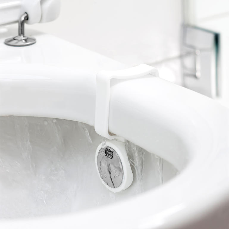 WC-Geruchskiller am Toilettenrand montiert