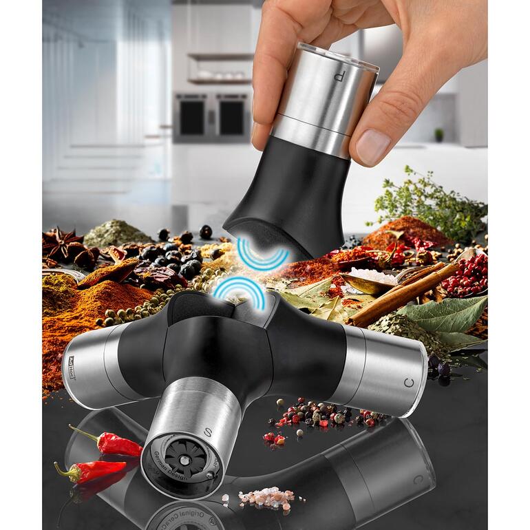 AdHoc® Multi-Gewürzmühle AdHoc Multi-Gewürzmühle in einer modernen Küchenumgebung mit Gewürzen auf dem Tisch.