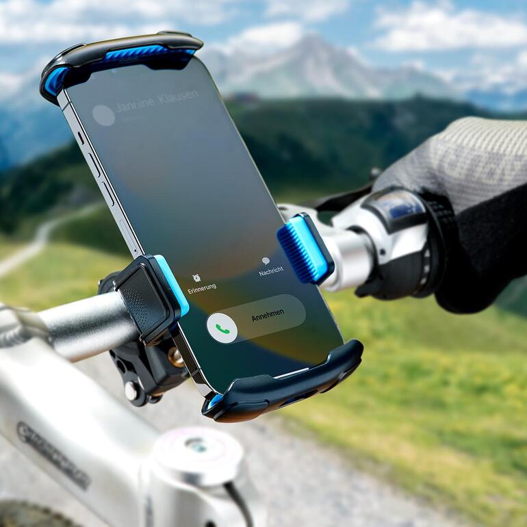 Smartphone-Halter am Fahrradlenker mit Smartphone.