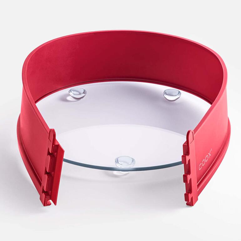 Silikon-Springform mit Glasboden in roter Farbe.