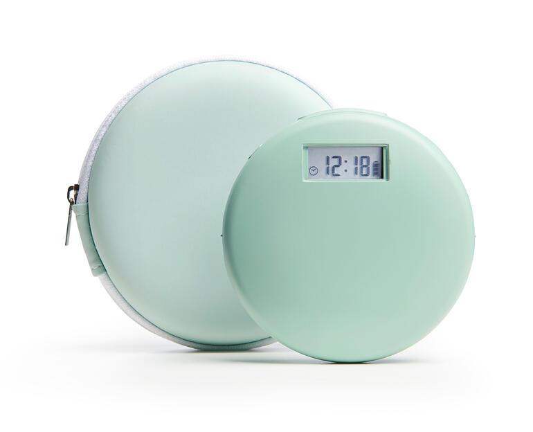 Vibrationswecker in zwei Größen, auf weißem Hintergrund, mit digitaler Anzeige.