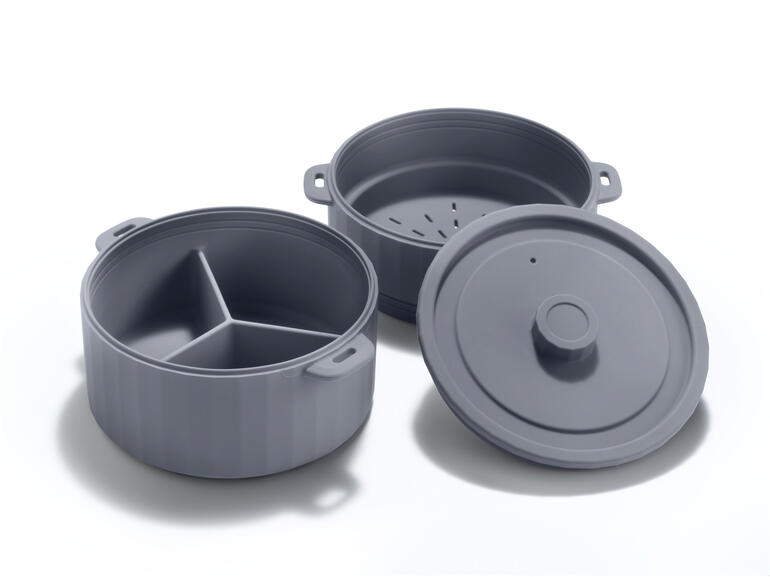 Doppelstöckiger Dampfgarer in grau, auseinander genommen mit Deckel.