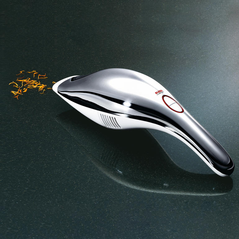 Alessi Akkusauger in Silber mit dekorativem Staubkegel.