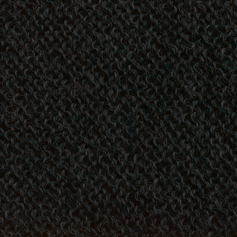 Texturierte Stoffprobe der schwarzen Alpaka-Weste.