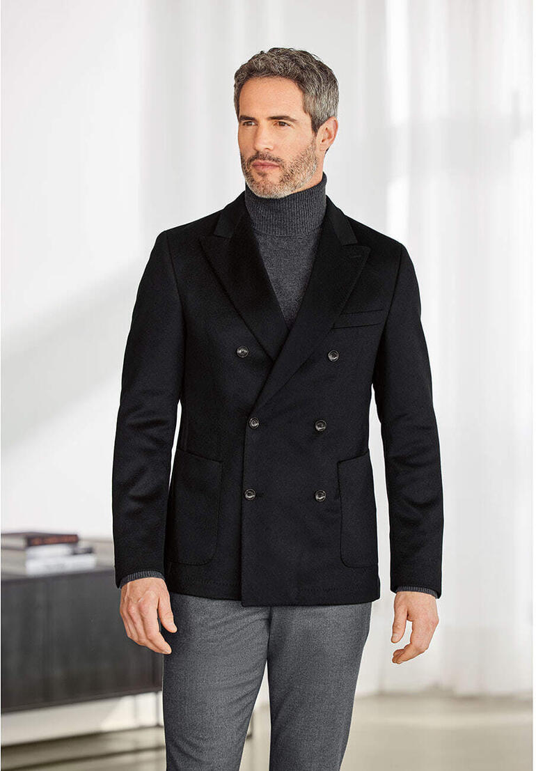 Carl Gross Kaschmir-Blazer Mann in schwarzem Kaschmir-Blazer, sieht elegant aus.