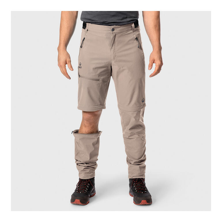 Beige Zip-Off-Softshell-Hose, Modell steht mit abnehmbaren Hosenbeinen.
