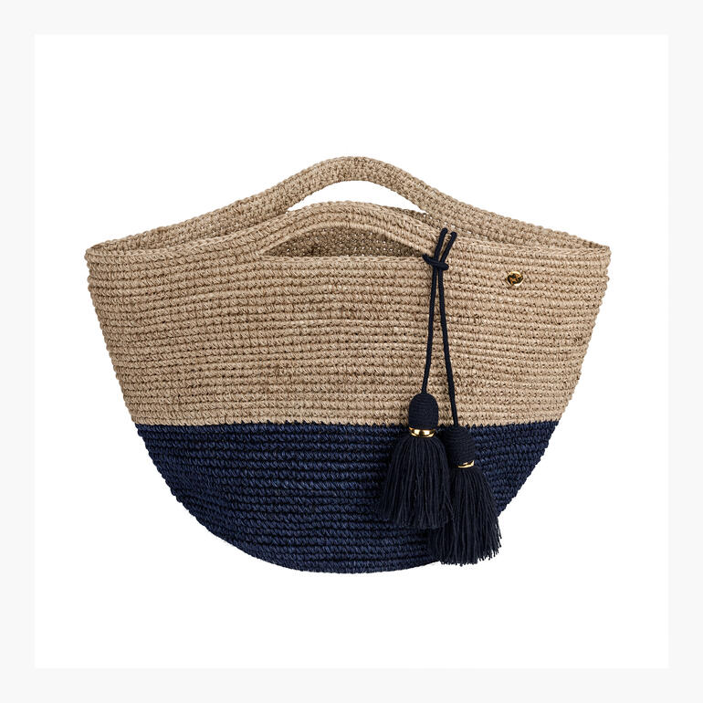 AALUNA Korbtasche mit hohem Rand und blauen und schwarzen Quasten.