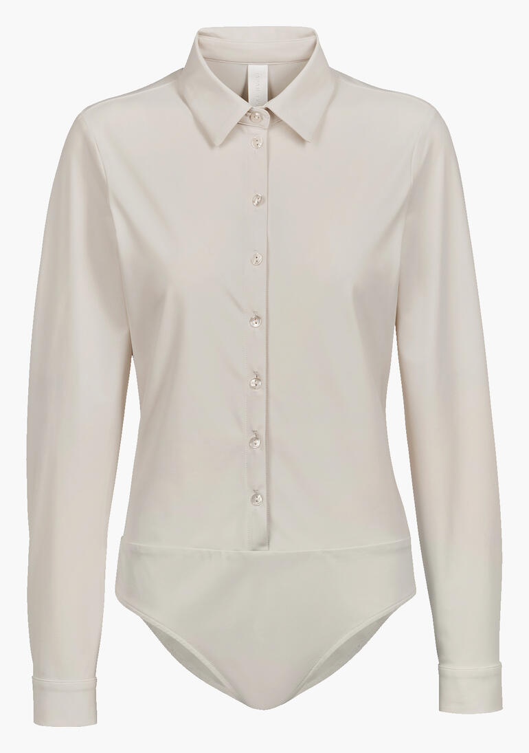 Beige Blusenbody mit langen Ärmeln und Knopfleiste.